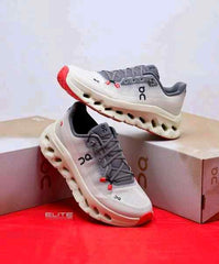 On Cloud tilt Running Rock Sand