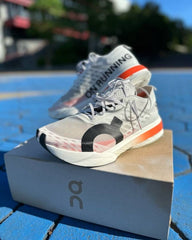 ON Running cloud boom STRIKE WHITE ORANGE