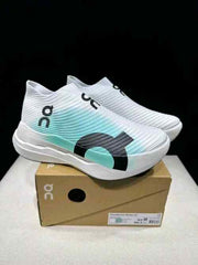 On Cloudboom Strike LS White and Mint Green