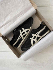 onitsukaa tiger mexico 66 slip on black putty